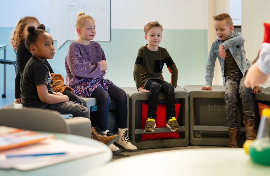 Bloxi blocks in classroom use, students seated in informal arrangement